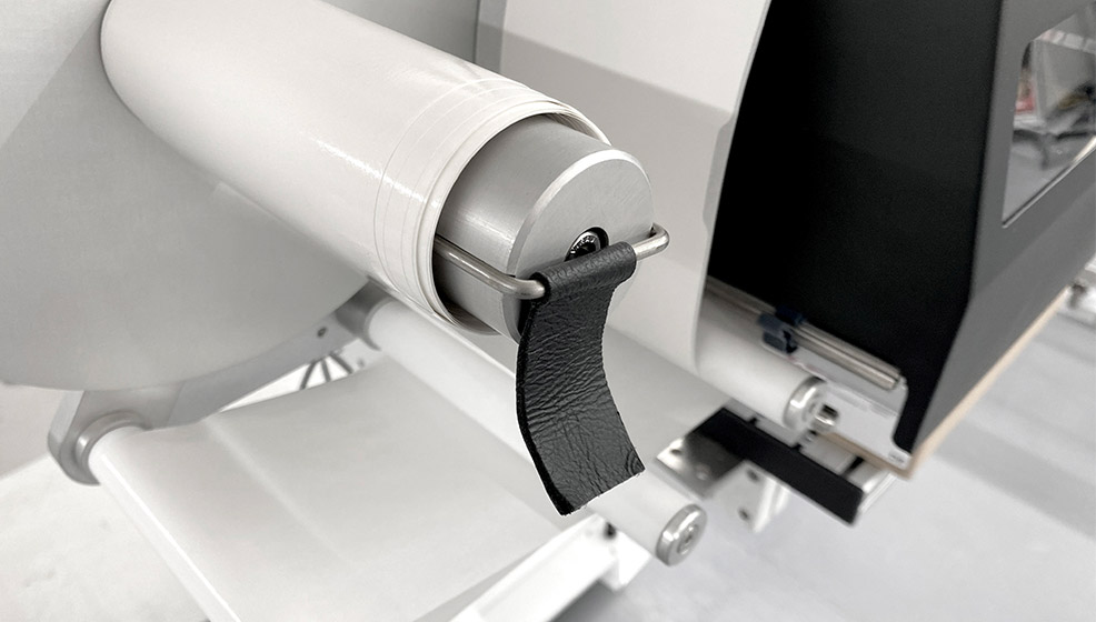 Transportband für Etikettenrolle